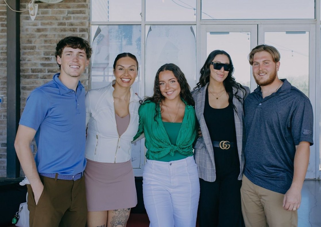 The SSOLD Realty Group team in Lubbock, Texas, with Joline Marie.